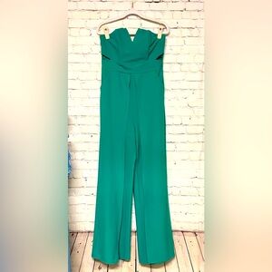 Luxxel Green Jumpsuit | Side cut outs | Flared-slit pant legs | Pockets | M